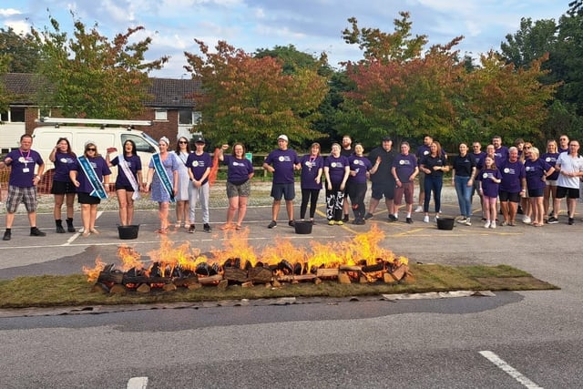 All fired up and ready for the challenge, 30 brave fund-raisers took part in the event - Wigan and Leigh Hospice Firewalk event