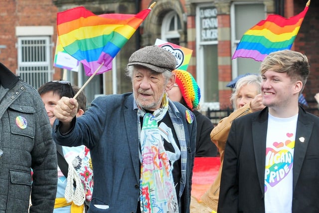 Sir Ian McKellen leads the Wigan Pride parade in 2017.