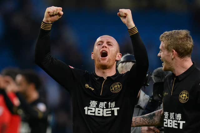 Stephen Crainey celebrates with James McClean during his playing days at Wigan