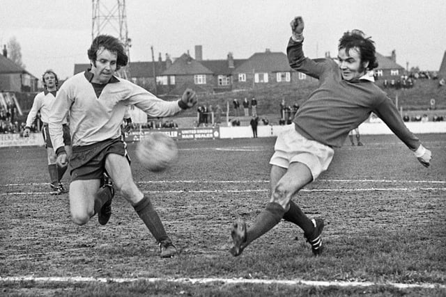 Wigan Athletic winger Paul Clements shoots for goal against Runcorn in the Northern Premier League match at Springfield Park on Friday 25th of April 1975. Latics won the game 2-0 with goals from Tommy Gore and Mickey Worswick.