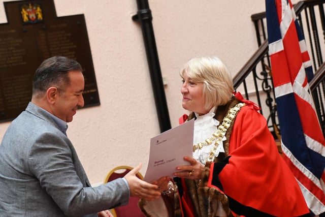 The Mayor of Wigan Coun Marie Morgan welcomes new citizens to the borough and presents certificates at the monthly British Citizenship ceremony.