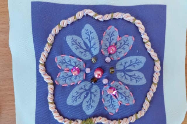 Embroidered 'lung' flower