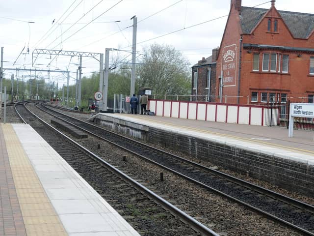 The casualty is believed to have been hit by a train close to Wigan North Western station