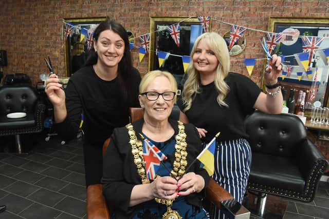 Photo Neil Cross; Mayor of Wigan Councillor Yvonne Klieve meets the new Ukraine refugee and salon employee, Inna Hashynskya, with salon owner, Joanne Cottom at Haus of Hair