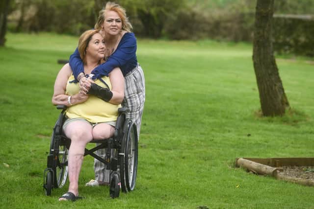 Emma Doherty has been left permanently disfigured and in a wheelchair after contracting necrotising fasciitis, also known as the "flesh-eating disease" and feels let down by support from the NHS. She is pictured with her mum Marie Keane.