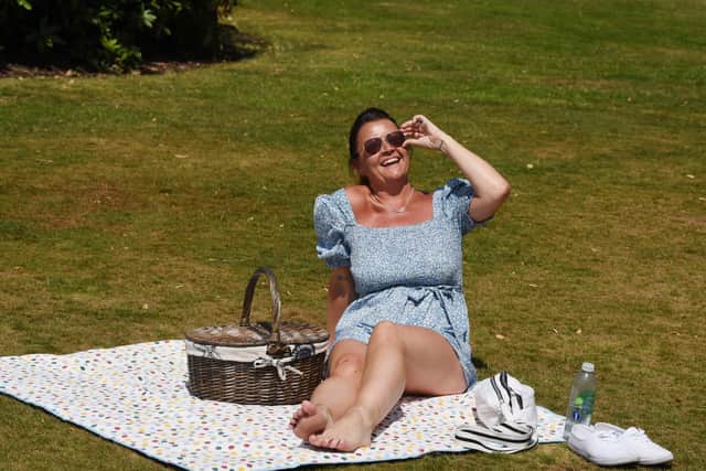 Rebecca Hitchen got outdoors to enjoy the sun at Mesnes Park on the hottest day of the year