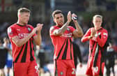 Charlie Wyke (far left) thanks the traveling fans who endured a tough afternoon at Bristol on Saturday
