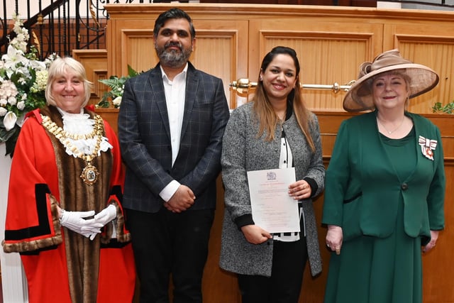 The Mayor of Wigan Coun Marie Morgan and representing His Majesty The King, Vice Lord-Lieutenant of Greater Manchester Sharman Birtles MBE (right) welcome new citizens to the borough at the monthly British Citizenship ceremony, held at Wigan Town Hall.