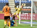 Fine goalkeeping from Will Mannion helped to keep out Latics until the second half