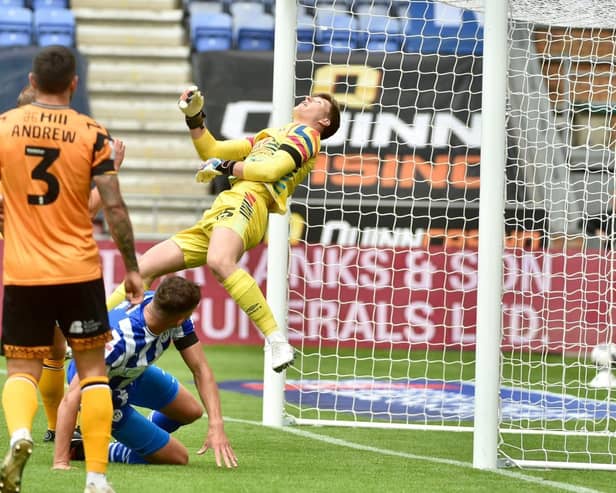 Fine goalkeeping from Will Mannion helped to keep out Latics until the second half