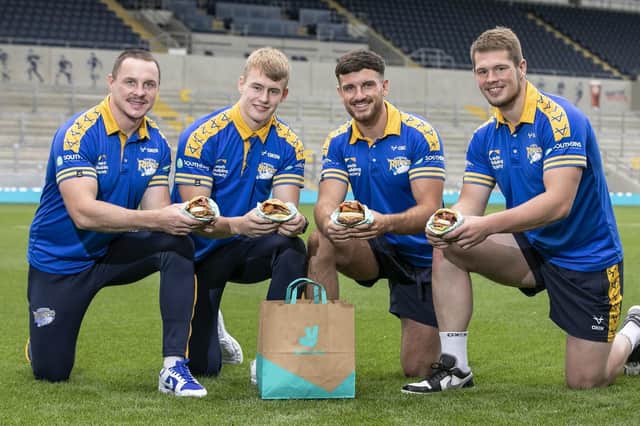 Leeds Rhinos players ready to tuck into a burger for National Burger Day, August 25