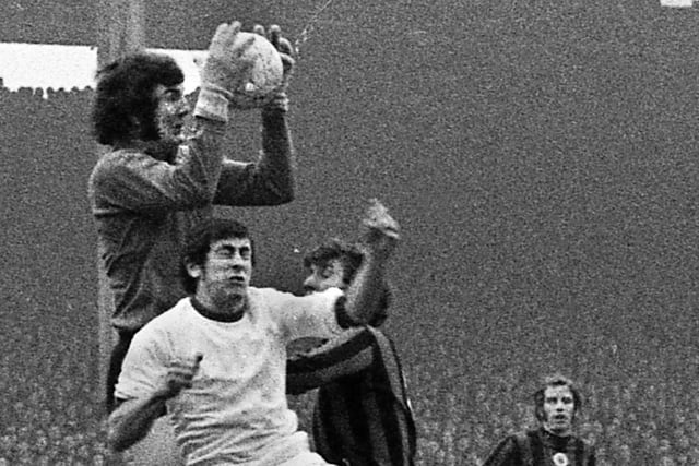 Wigan Athletic forward, Geoff Davies, has the ball taken off his head by Manchester City goalkeeper, Joe Corrigan, during the FA Cup 3rd round match at Maine Road on Saturday 2nd of January 1971.  Non league Wigan were unlucky to lose against high flying 1st Division side Manchester City to a Colin Bell goal in the 1-0 result.