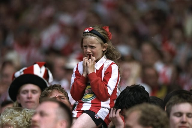 2A young Sunderland fan watches the Division One play-off final against Charlton Athletic at Wembley Stadium in London. The match ended in a 4-4 draw after extra time and Charlton Athletic went on to win 7-6 on penalties.