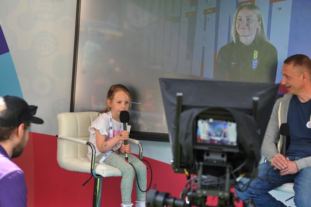 Family fun at children and adults take part in the interactive workshops at the Women's Euro 2022 Roadshow, held at Mesnes Park, Wigan.