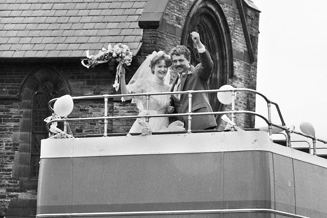 A busman's wedding day.....GM bus driver Philip McKay and bride Paula Barrow take appropriate transport to the reception after their marriage at St. Mark's Church, Newtown, on Saturday 18th of March 1989.