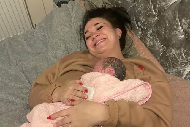 Georgie gave birth on her own bed after feeling an urge to push