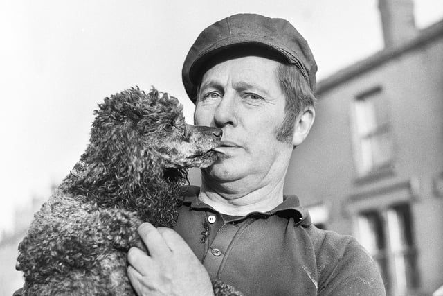 A local resident with his best pal in Chapel Street, Lower Ince, in December 1971.