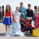 Staff and pupils dressed as superheroes and princesses in memory of Holly Prince