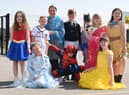 Staff and pupils dressed as superheroes and princesses in memory of Holly Prince