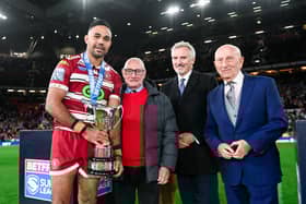 Bevan French is presented the Rob Burrow Award by Rob’s dad, Geoff