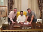 Leam Richardson, with Latics chief executive Mal Brannigan and club owner Abdulrahman Al Jasmi