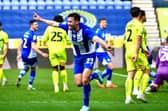 James Carragher nods home the only goal of the game