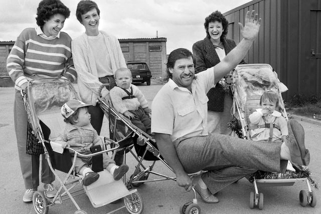 Former Wigan Rugby League Club forward Danny Campbell launches a charity pram push in aid of Highfield Grange Mother and Toddler Group with Sandra Bryden and son Paul, Debbie Chandler and son Christopher and Karen Barton and daughter Emma at Highfield on Sunday 10th of May 1987.