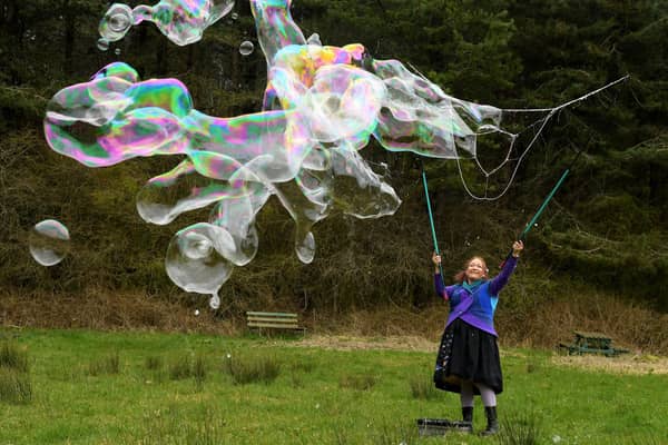 Emma Pickering from eBublio Magical Bubbles with her giant bubbles