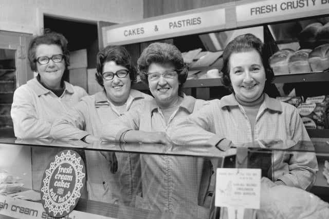 Happy to serve you, the ladies of Rathbones confectionery shop in Wigan in 1973.