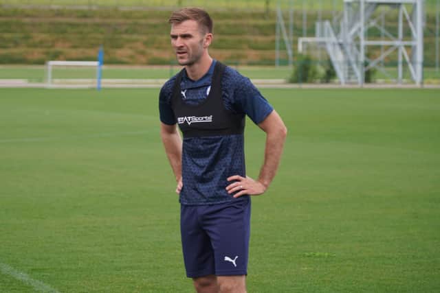 Callum McManaman has won himself a new deal with Latics after almost six months of toil on the training ground