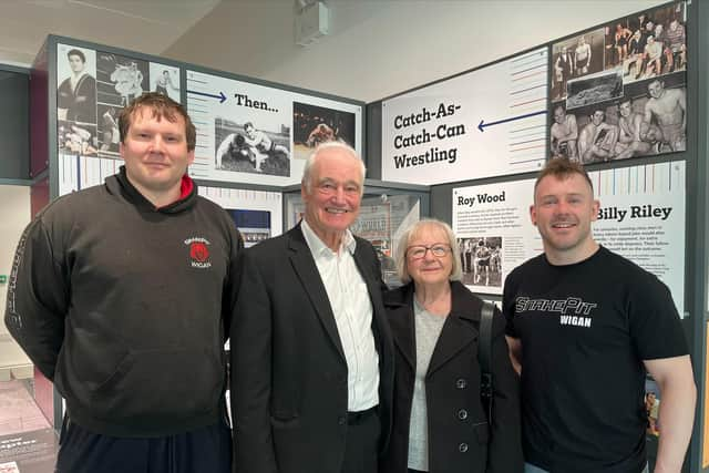 Roy Wood and representatives from Snakepit Wrestling gather at the exhibition