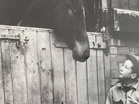 Lester Piggott, aged 12, at his father's stables on the day of his first race at Haydock Park