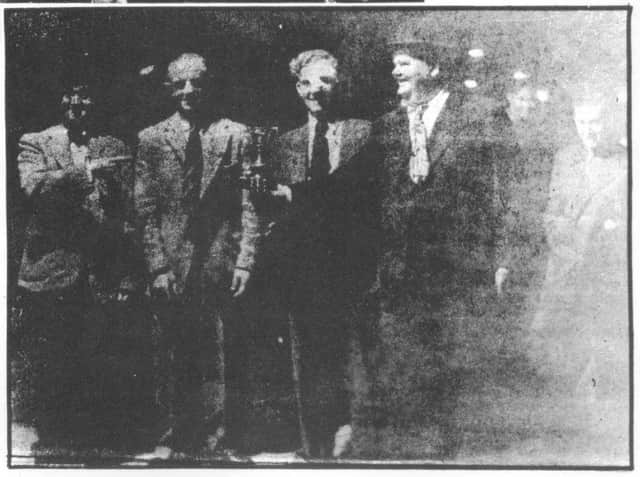 Laurel and Hardy with, left to right between them, Oliver and Ron Hart who owned Poolstock Greyhound and Speedway Track