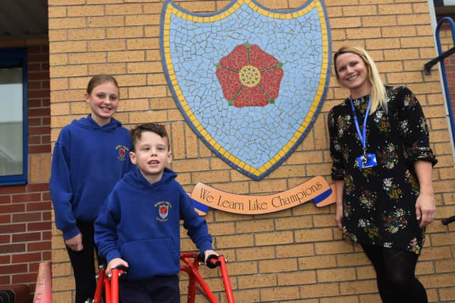 Headteacher Helen Smart (right) pictured with pupils at Worsley Mesnes Community Primary School, Wigan, in October 2022