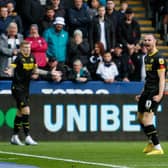 Will Keane celebrates his opening goal, off James McClean's corner