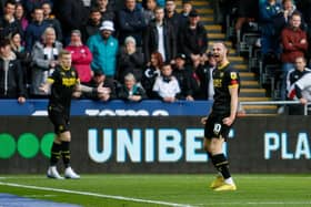 Will Keane celebrates his opening goal, off James McClean's corner