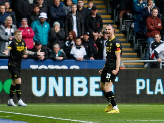 Will Keane celebrates his opening goal, off James McClean's corner