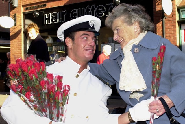 Hello sailor!  74-year-old Peggy Fairclough was swept off her feet by handsome hunk, Barry Simms, who was handing out roses for Valentines Day around the Galleries shopping centre, Wigan.