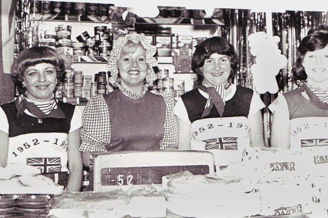Celebrating the Queen's silver jubilee on Leyland's grocery stall in the old Wigan market hall in 1977.