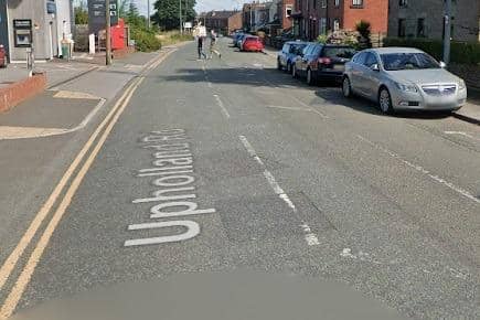 A section of Up Holland Road was cordoned off to traffic for several hours after the collision