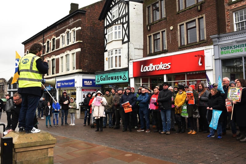 Crowds gathered in Wigan town centre to highlight disputes and oppose Government legislation
