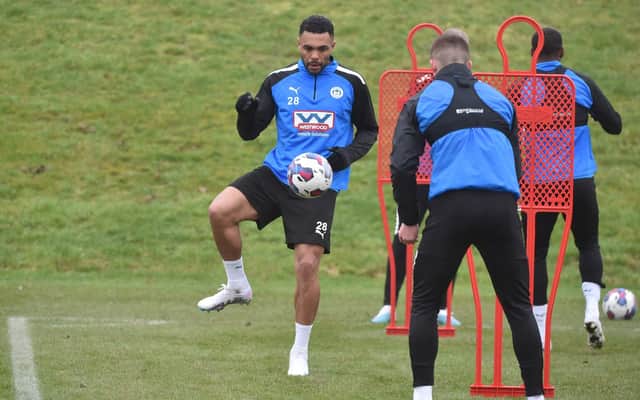 Shaun Maloney watches over training