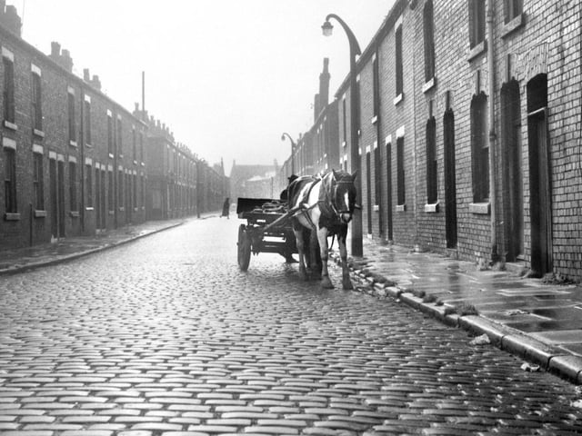 A scene from a Wigan street in the Scholes area about to be demolished in 1971.