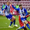Jensen Weir and Thelo Aasgaard ended the game in the centre of the Latics midfield, after the former had started in the latter's usual No.10 role