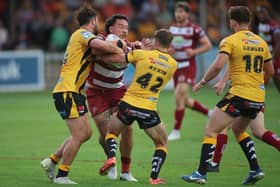Wigan Warriors prop Tyler Dupree on the charge against Castleford Tigers