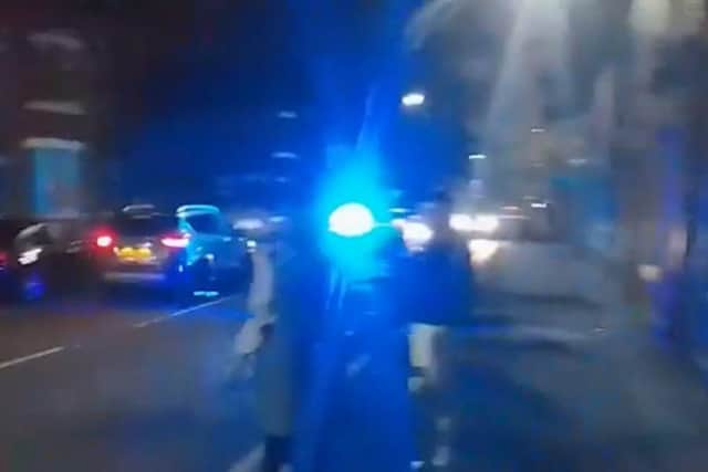 Video footage taken at the scene showed angry residents gathering in the street after their cars were vandalised