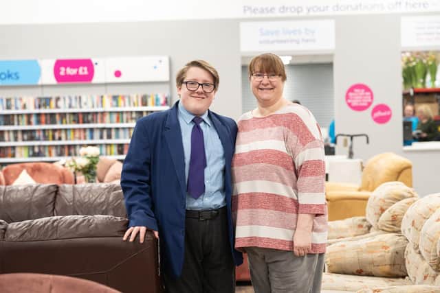 Luke with his mum Deborah at the new Cancer Research superstore