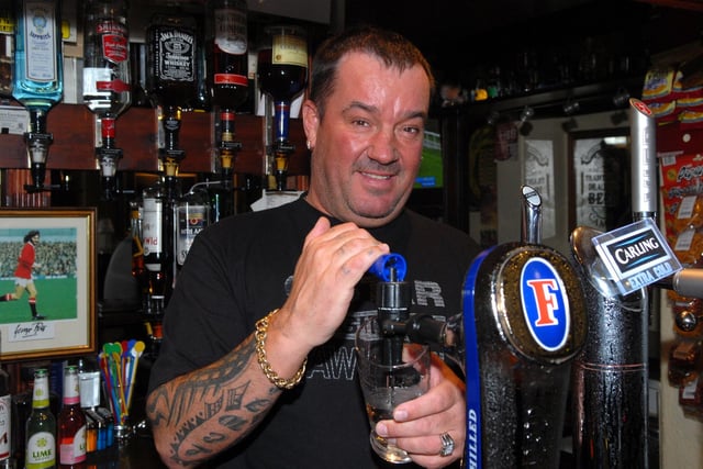Pub Life - The Queen's Head at Aspull manning the pumps landlord Kevin Shaw, 2009