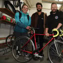 Mark Harrison, right, director at Wigan Cycle Project, with Ellen Holme and Ben Porter