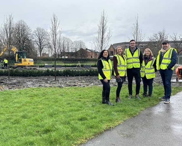 At Mesnes Field in Wigan are Iona Fazer – Safer Sphere (construction health and safety); Georgina Roby – Wigan Council, Service Manager – Culture & Events; Jon Hutchinson – Groundwork CLM (lead consultant and site management); Sharon Andrews – Ground Inc (landscape contractors); and Ben Bevan – Hardscape (stone bench manufacturers and paving suppliers)